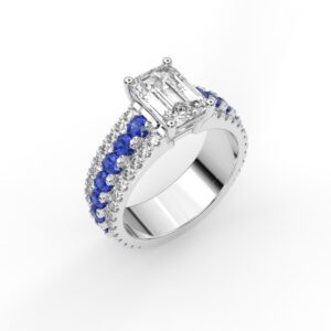 Custom emerald-cut diamond engagement ring with diamonds and sapphires in the band, designed in Greenville, South Carolina